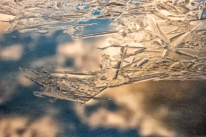 onset of winter, water surface freezes over, close-up onset of winter, water surface freezes over, close-up